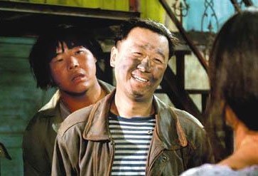 憨厚老实的微笑